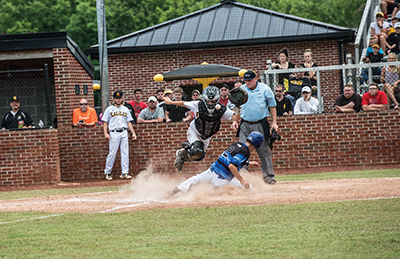 Jaxon Watts slides into home